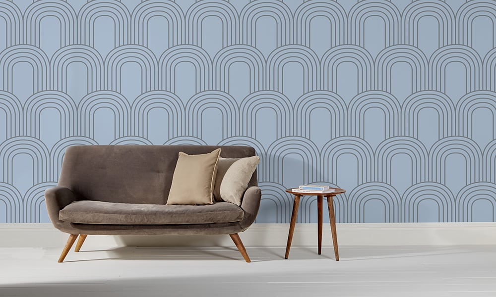 Blue retro geometric wallpaper in a large size pattern in a living room