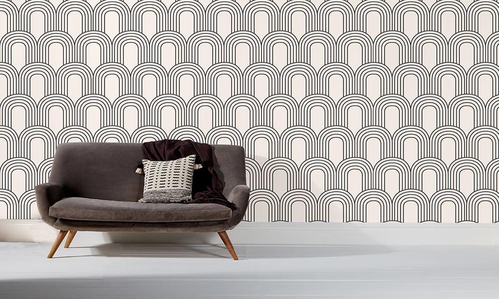Medium sized arch shaped retro black and white wallpaper design in a living room 