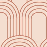 Pastel pink background with terracotta arch pattern wallpaper in a living room