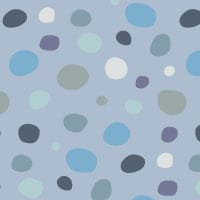 Dotty wallpaper design in various blue colours in a child's bedroom 