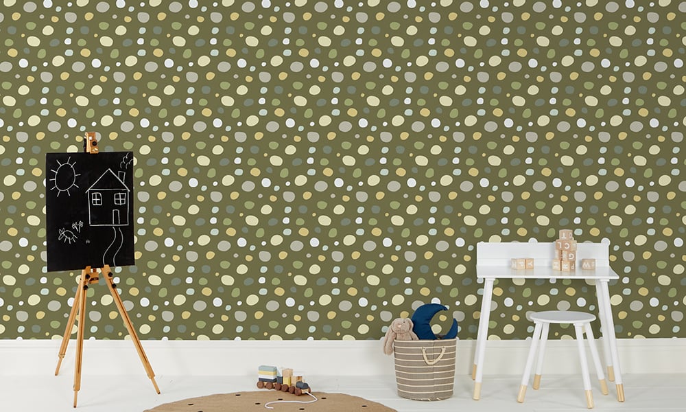 Playful green spot print wallpaper in a medium size pattern in a kid's bedroom