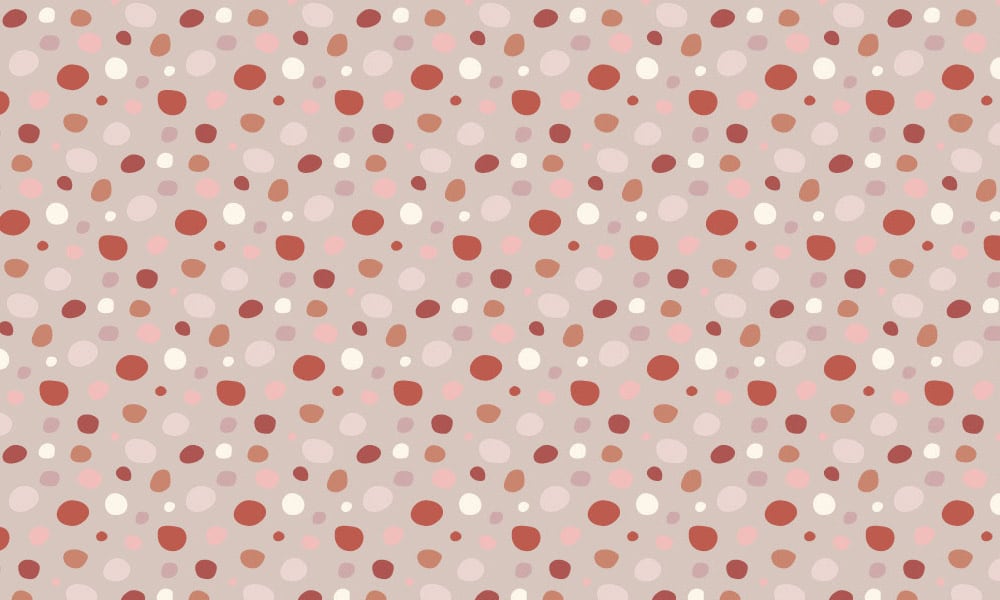 Fun spotty wallpaper design in a pink colour palette