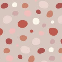 Girlie pink dotty print wallpaper design in warm colour tones in a child's bedroom