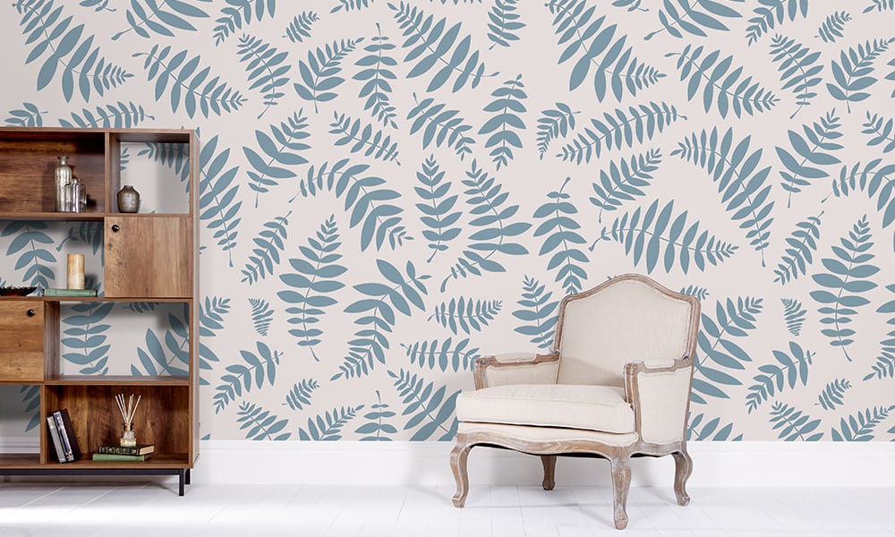 Blue bracken leaf wallpaper design in a large-sized pattern in a living room 