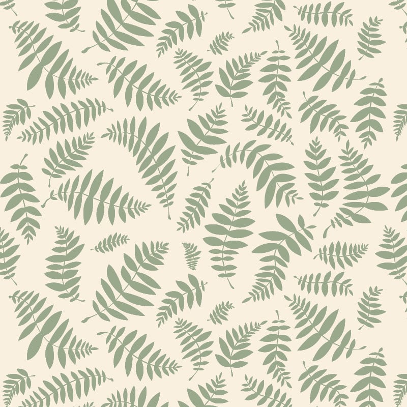 Leafy green bracken wallpaper design in a lounge with bookcase