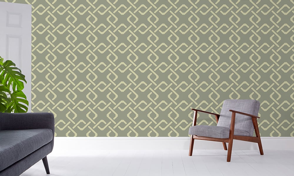 Geometric sage green wallpaper design in a large-sized pattern in a living room