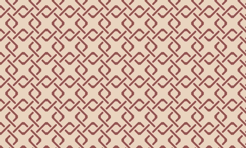 Red geometric pattern wallpaper with neutral background