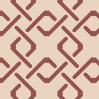 Red geometric pattern wallpaper with neutral background colour in a lounge 