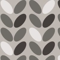 Modern wallpaper design in a grey colour palette in a living space with a grey chair