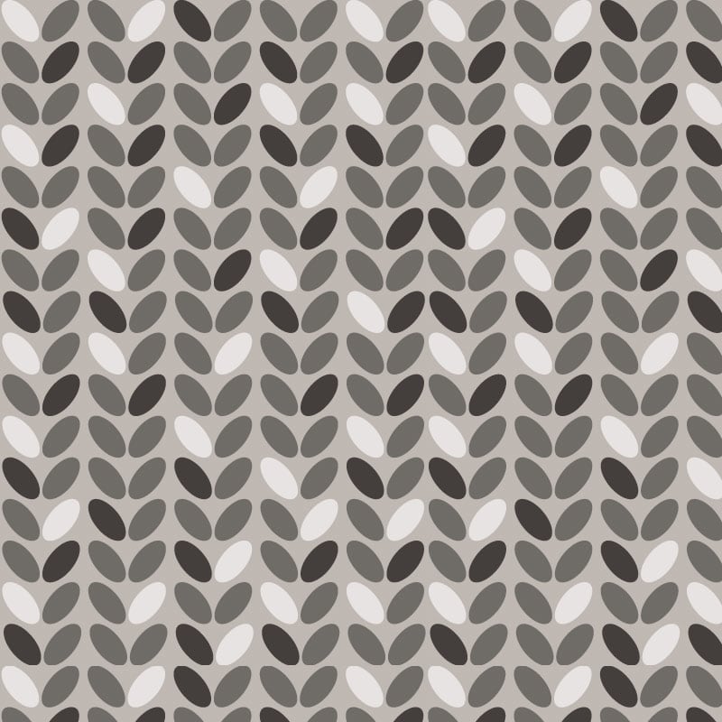 Modern wallpaper design in a grey colour palette in a living space with a grey chair