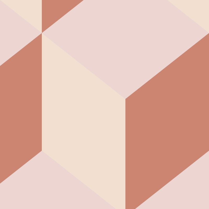 Grey sofa in a living room with geometric wall mural in orange and pink colours