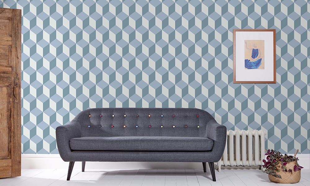 Modern cube-shaped wallpaper design in a blue colour palette in a living room