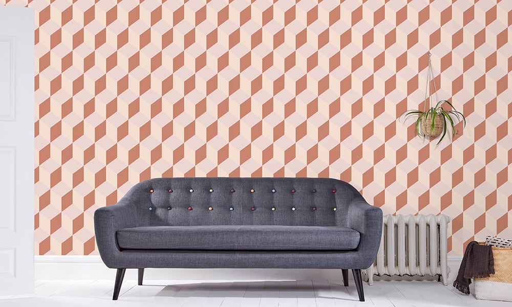 Medium-sized cuboid wallpaper pattern in an earthy orange colour palette in a living room