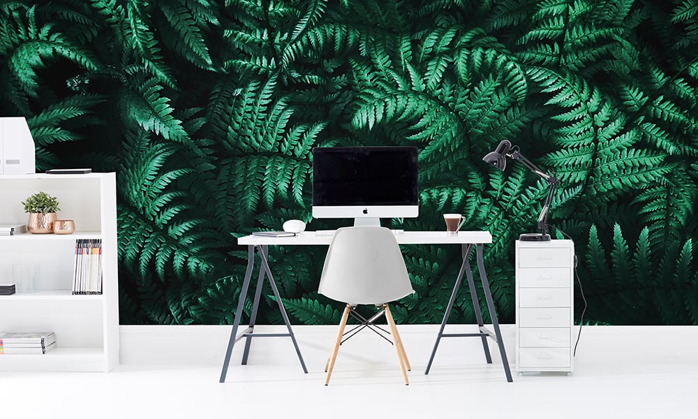 Home office with green fern wall mural