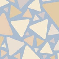 Triangular pattern wallpaper in blue and neutral colour tones with a grey chair