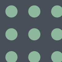 Navy and green dotty wallpaper pattern in a bedroom 