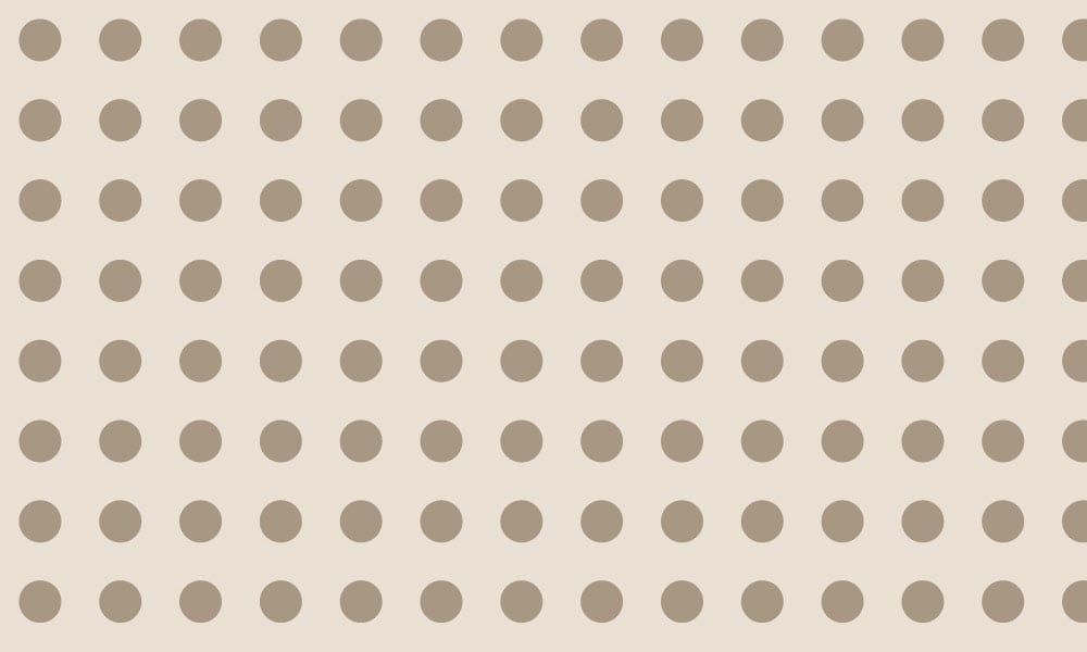 Modern wallpaper design with a neutral background and taupe polka dot pattern