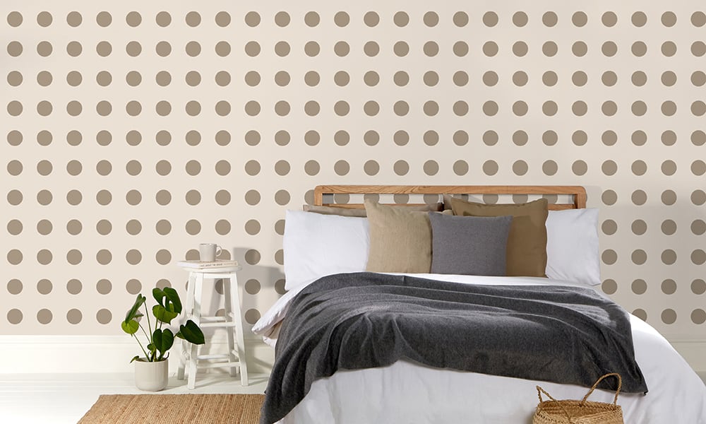 Taupe polka dot in a medium-sized pattern in a bedroom setting