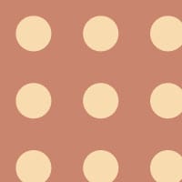 Terracotta orange polka dot wallpaper design in a bedroom 
