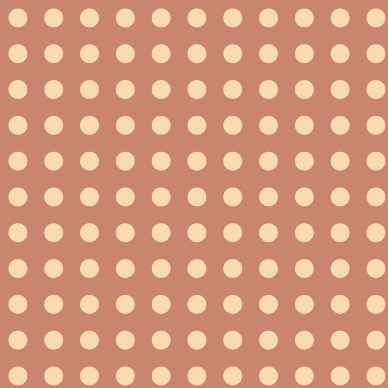 Terracotta orange polka dot wallpaper design in a bedroom 
