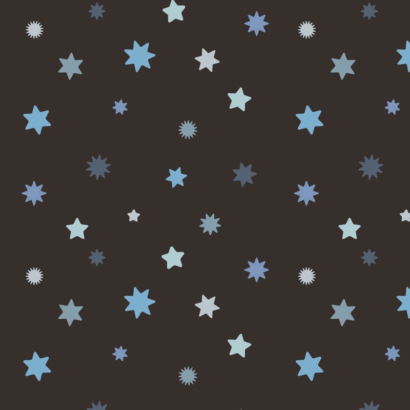 Starry wallpaper in a child's bedroom with black background and blue stars