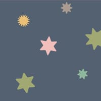 Pastel coloured starry wallpaper in a kid's bedroom