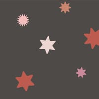 Dark night sky wallpaper with pink and red stars in a child's bedroom