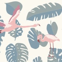 Grey chair with flamingo pink and teal wallpaper in a living room