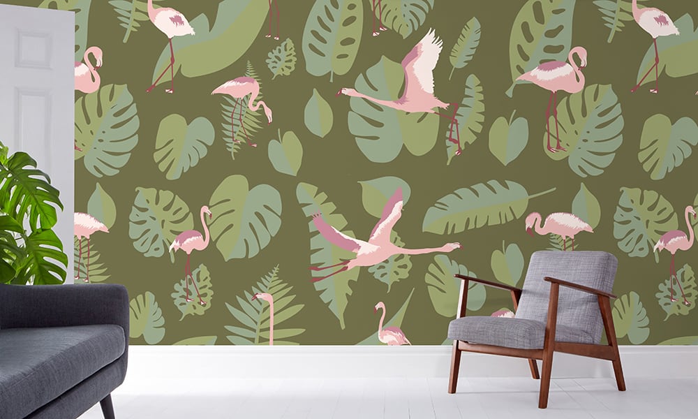 Large-scale pink flamingo and green leaves wallpaper
