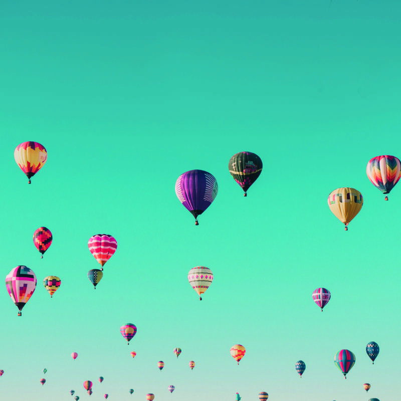 Office with a colourful hot air balloon blue sky wall mural