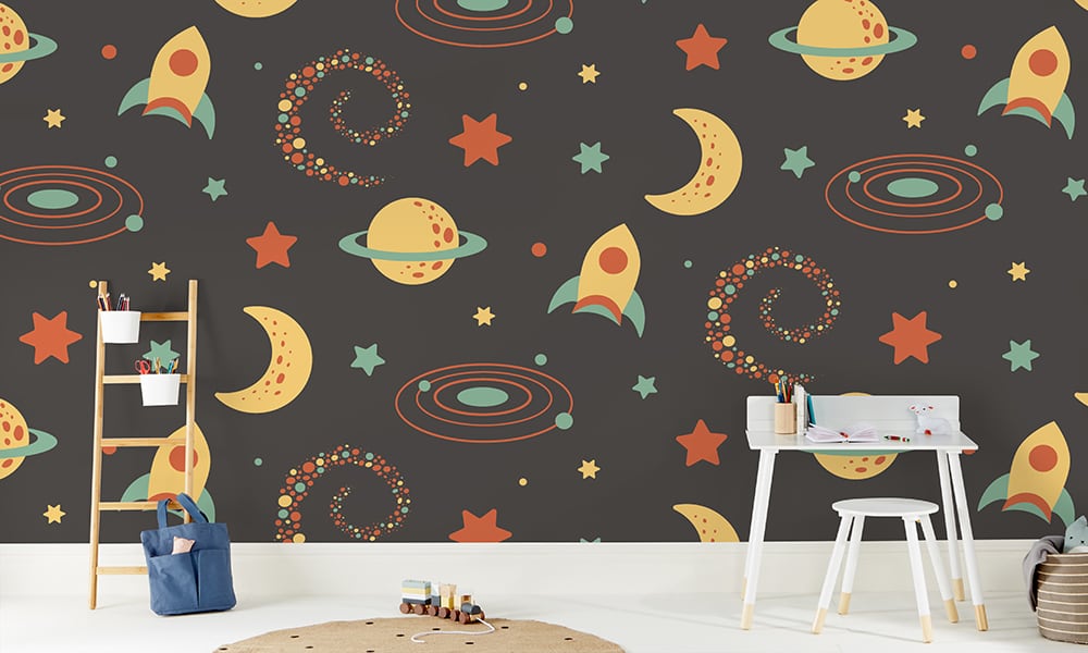 Large-scale space-themed wallpaper with a pitch black night sky in a kid's room
