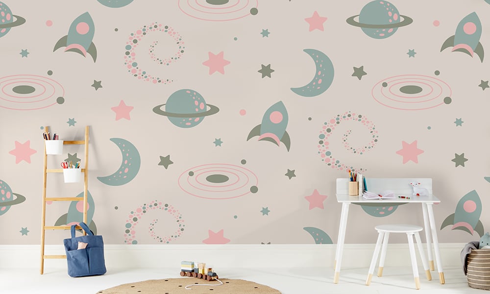 Large-scale space-themed wallpaper for a child's bedroom in pastel colours