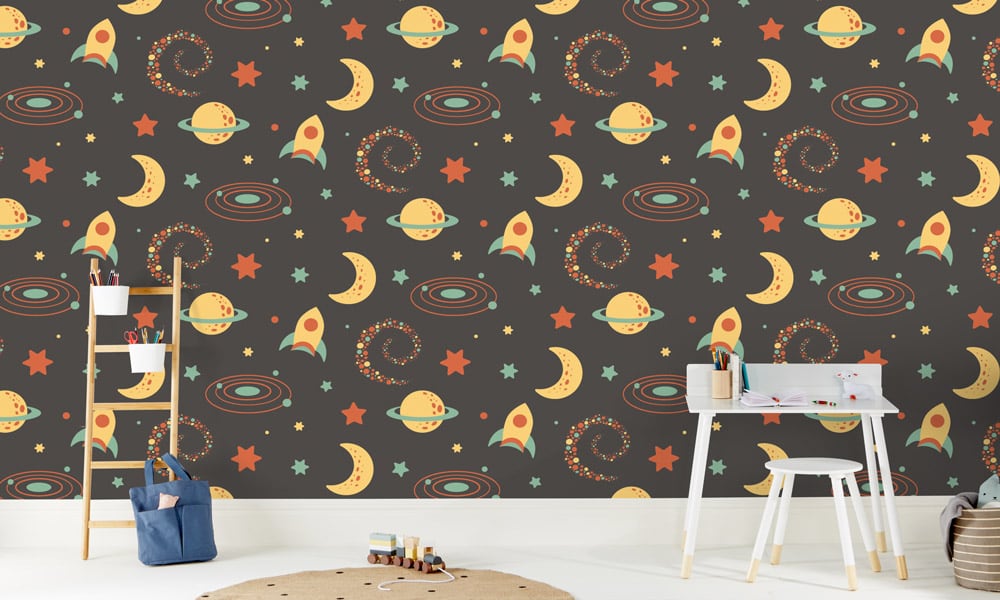 Children's space-themed wallpaper with a blck night sky and rockets, stars and moons 