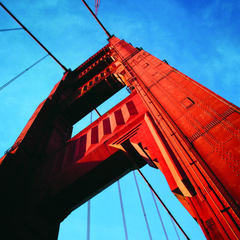 San Francisco  Golden gate bridge wall mural with clear blue sky and grey chair