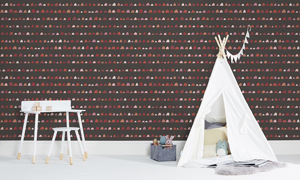 Red humps wallpaper pattern on dark grey background in kid's room