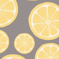 Lemon wallpaper with grey background in office with iMac and desk