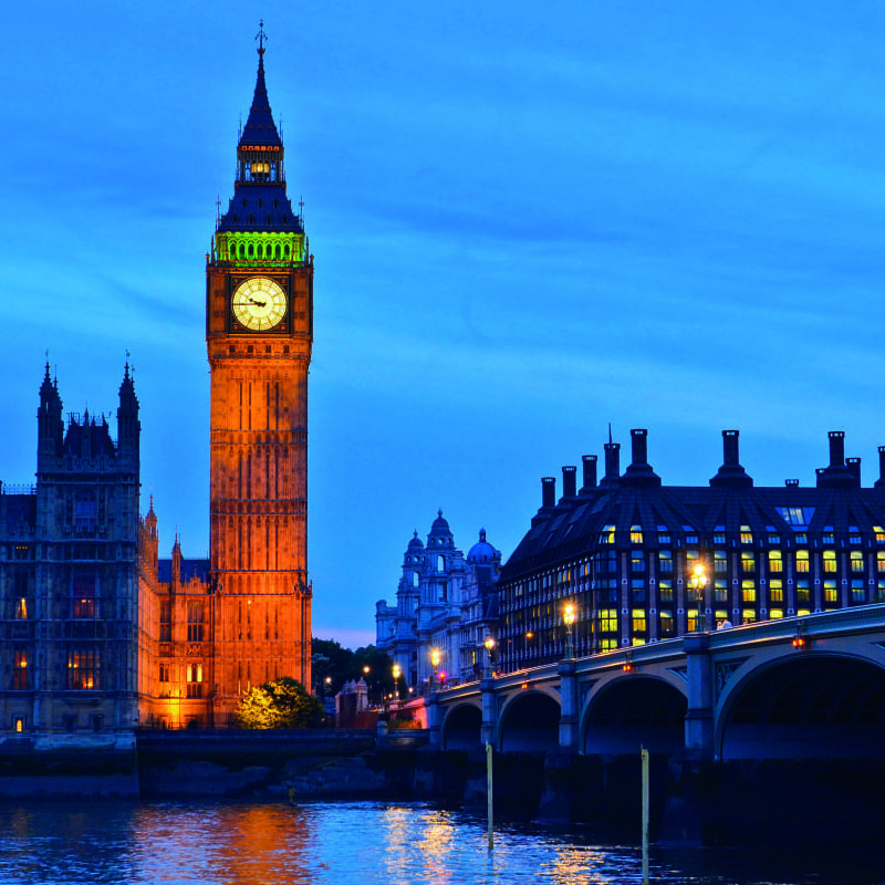 Living room with a London themed wall mural featuring big ben and the houses of parliament