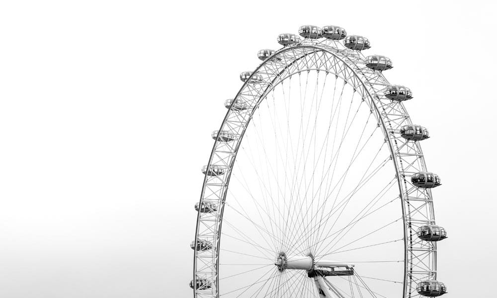 Black and white angled shot of London eye