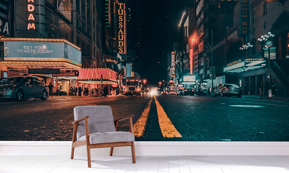 Night-time street view of New York City wall mural in a living room setting  
