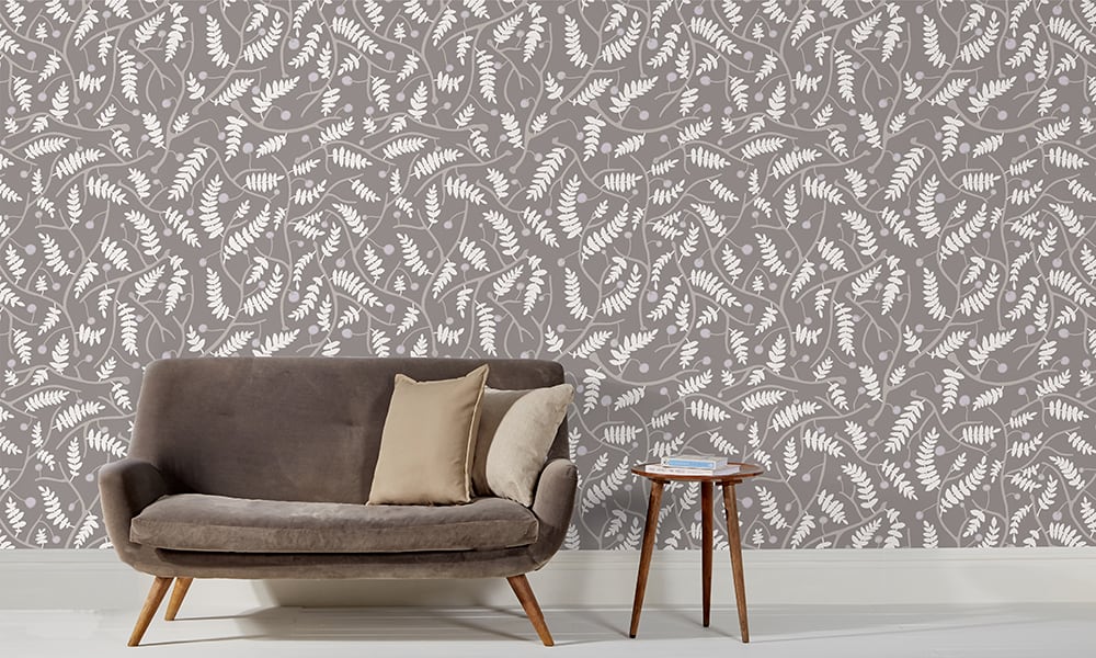 Grey wallpaper in a medium scale situated in living room with grey sofa 