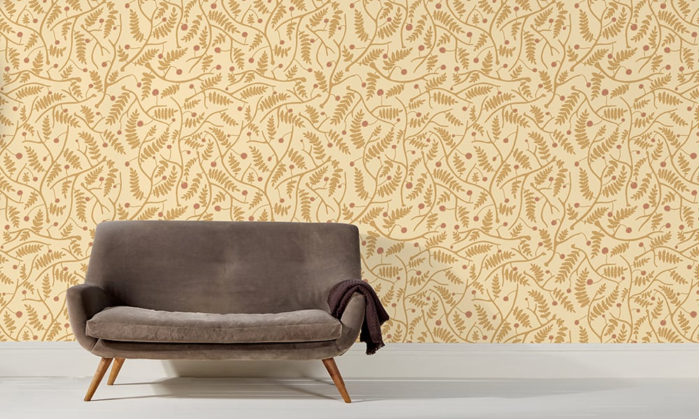 Honey wallpaper in a medium scale situated in living room with grey sofa 
