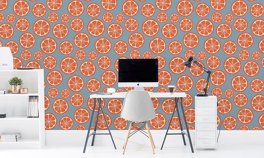 Sliced orange wallpaper design in medium scale with desk and chair