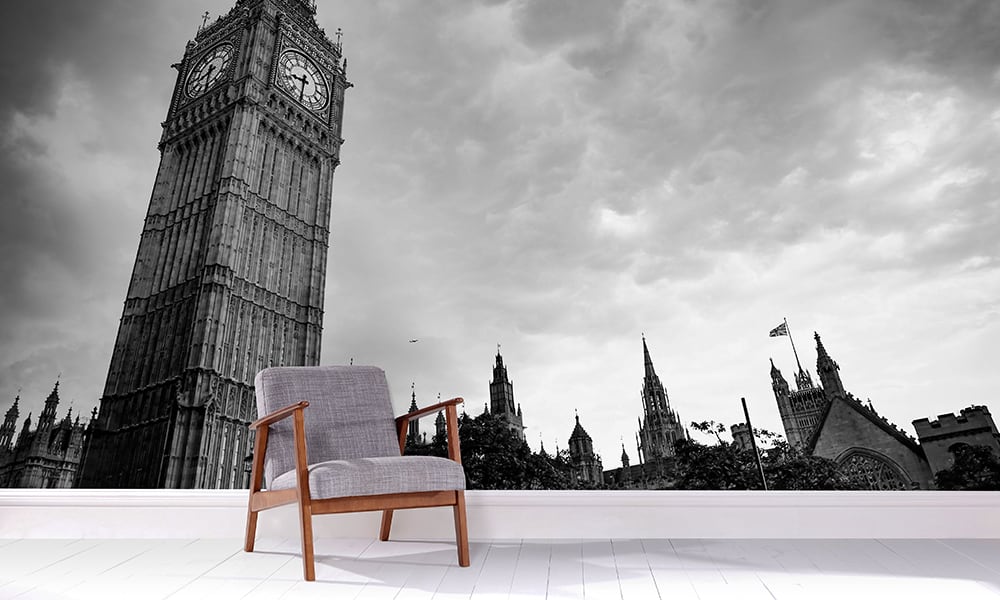 Big Ben and Houses of Parliament themed wall mural in a living room with grey chair