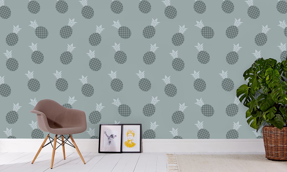 Medium scale pineapple wallpaper in blue situated in living area