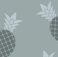 Pineapple wallpaper design in blue with grey chair and picture frame