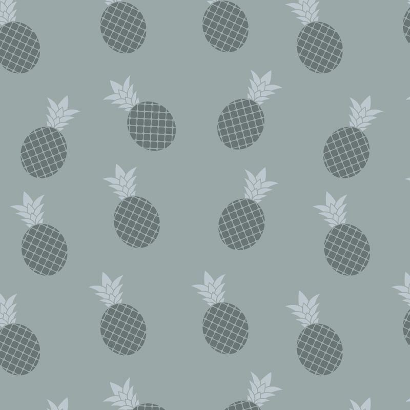 Pineapple wallpaper design in blue with grey chair and picture frame