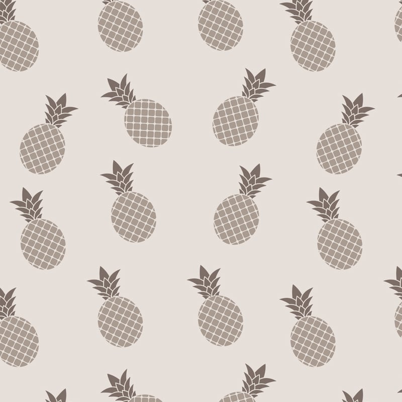 Pineapple wallpaper design in grey with grey chair and picture frame
