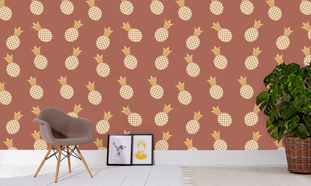 Medium scale pineapple wallpaper in red situated in living area