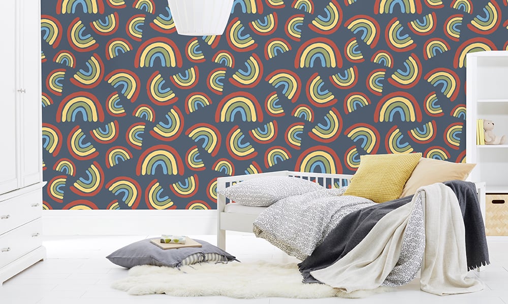 Medium scale rainbow patterned wallpaper with blue background