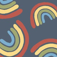 Rainbow pattern wallpaper in kids bedroom with yellow cushion and rug